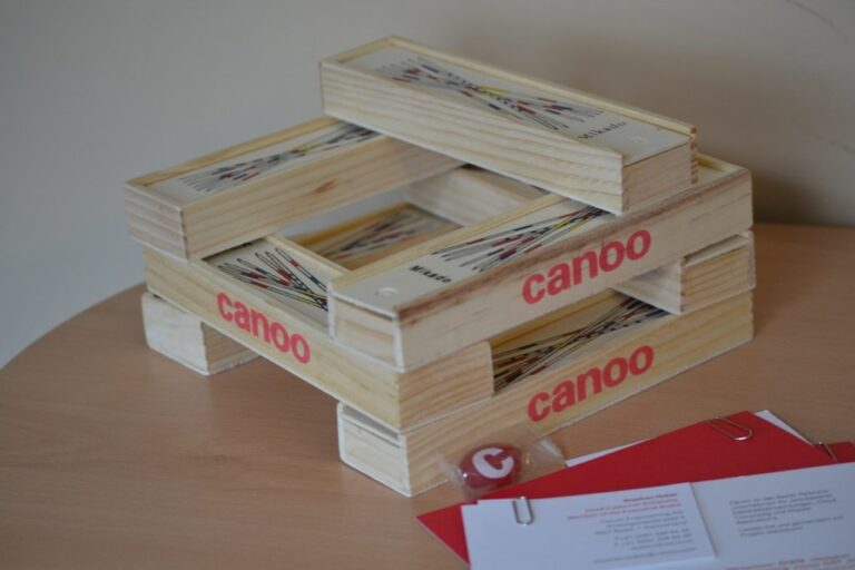 Stacked boxes with the Canoo logo