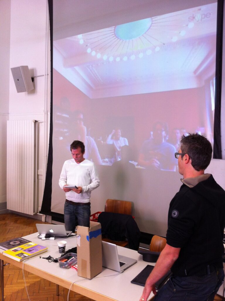 Presentation in front of a large projection