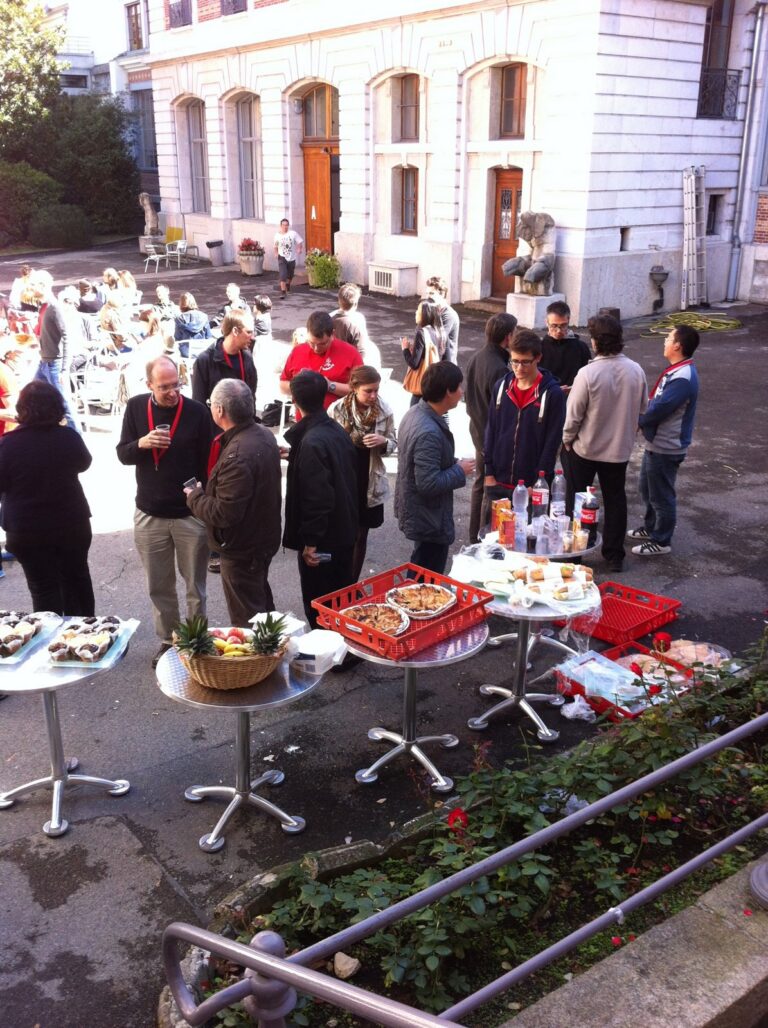 Drinks in the courtyard with many participants