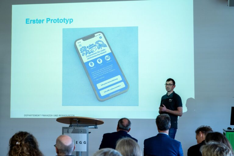 A team shows its first prototype at the media event
