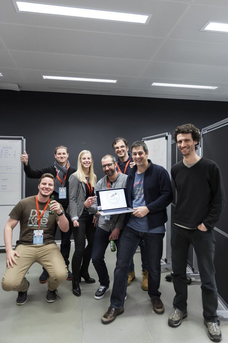 Ein Team nach den Präsentationen