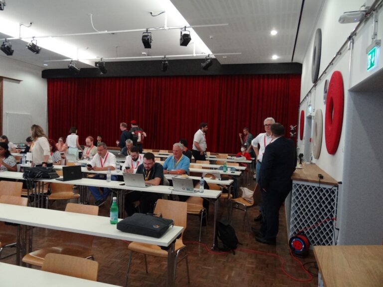 Full main hall with red curtain