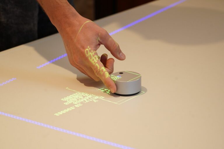 Controlled by hand: data projected onto the table