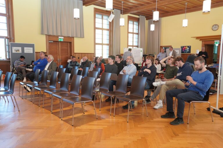 The audience before the presentations
